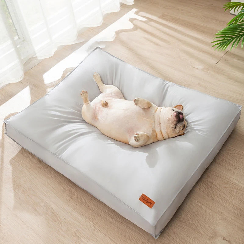 Durable waterproof pet bed for dogs and cats, orthopedic memory foam cushion with washable, water-resistant cover and non-slip base.