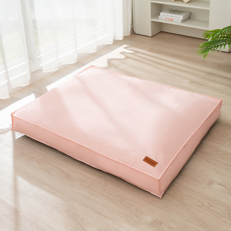 Durable waterproof pet bed for dogs and cats, orthopedic memory foam cushion with washable, water-resistant cover and non-slip base.